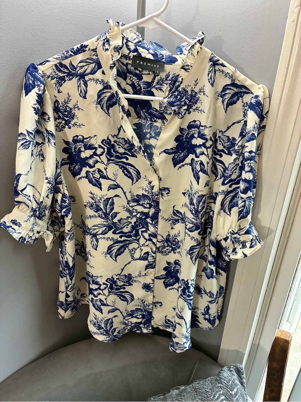 Premise Cream Blouse with Blue Floral Print and Ruffle Neck